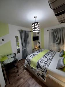 Ένα ή περισσότερα κρεβάτια σε δωμάτιο στο Apartmány Freesia
