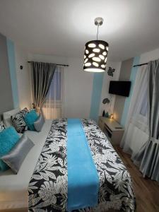Postel nebo postele na pokoji v ubytování Apartmány Freesia