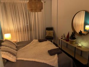 Posteľ alebo postele v izbe v ubytovaní Apartament EverySeason Karpacz