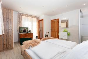 A bed or beds in a room at Gruberbauer Remsach