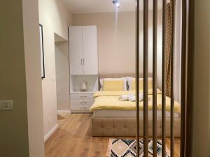 Letto o letti in una camera di AJ Apartments - Hidden Gem in front of Taiwan Center