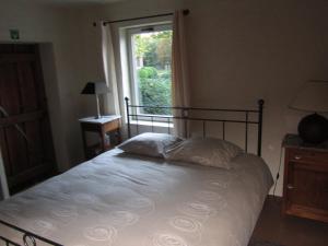 Ein Bett oder Betten in einem Zimmer der Unterkunft B&B De Hulst