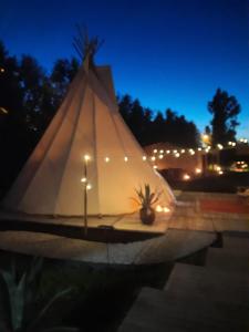 Fotografie z fotogalerie ubytování Tipi Marie met hotutub in de tuin v destinaci Kaprijke