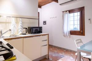 Η κουζίνα ή μικρή κουζίνα στο Casa Romana