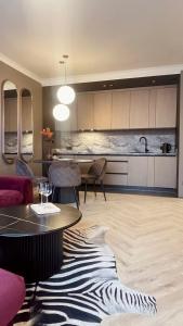 Η κουζίνα ή μικρή κουζίνα στο Prosecco Apartaments - Śródmieście Rzeszów
