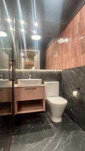 Ένα μπάνιο στο Prosecco Apartaments - Śródmieście Rzeszów