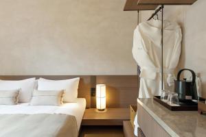 Letto o letti in una camera di Linggan Anyu Hotel