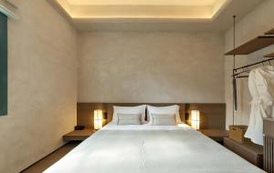 Letto o letti in una camera di Linggan Anyu Hotel