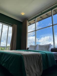 Letto o letti in una camera di Cloudscape Breeze