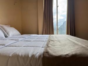 Letto o letti in una camera di Cloudscape Breeze
