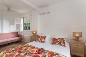 Postel nebo postele na pokoji v ubytování Villa M'Bay