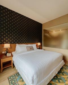 Katil atau katil-katil dalam bilik di Abhayagiri - Sumberwatu Heritage Resort