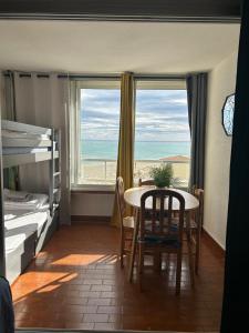 Posteľ alebo postele v izbe v ubytovaní Appartement de vacances - Splendide vue sur mer, Parking privé