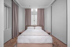 Letto o letti in una camera di Linggan Anyu Hotel