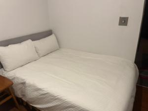 Postel nebo postele na pokoji v ubytování 他里霧Ta Li Woo
