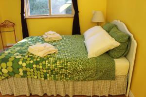 Uma cama ou camas num quarto em Hilltops