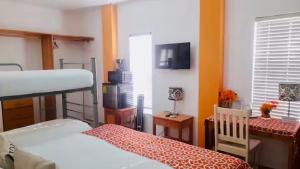 Postel nebo postele na pokoji v ubytování Las Palmas Beach villa 0230