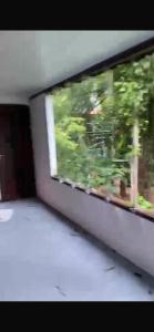 a view of a window of a train at Botânico inn in Morro de São Paulo