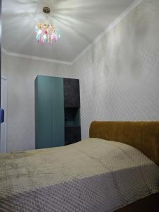 Ένα ή περισσότερα κρεβάτια σε δωμάτιο στο Garden Terrace Kvareli +21 φωτογραφίες