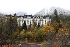 a large white building on top of a mountain at ALPINSTAR in Chamonix-Mont-Blanc