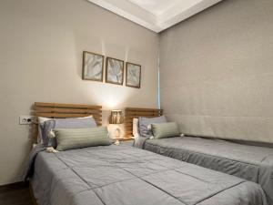 Postel nebo postele na pokoji v ubytování Mynt Stay zed west Residence 2 bedroom E1E293
