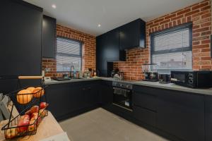 Kuchyň nebo kuchyňský kout v ubytování Cosy Flat Sleeps 5 -Links to Central London - Flat 3 + 11 fotografií