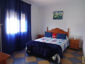 Postel nebo postele na pokoji v ubytování La casa de Pilar