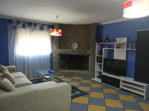 TV a/nebo společenská místnost v ubytování La casa de Pilar