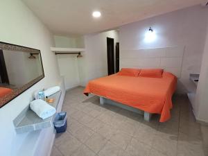 Postel nebo postele na pokoji v ubytování Hotel Rath
