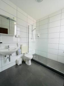 Koupelna v ubytování Ansbach City Hotel - Arbeiter Hotel
