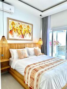 Postel nebo postele na pokoji v ubytování Ellies Hotel + 37 fotografií