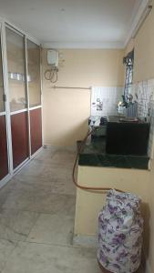 Kuchyň nebo kuchyňský kout v ubytování 2BHK Diamond Suite + 3 fotografie