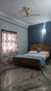 Postel nebo postele na pokoji v ubytování 2BHK Diamond Suite