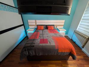 Кровать или кровати в номере Alójate en Vigo! Casita bien equipada