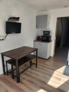 Kuchyň nebo kuchyňský kout v ubytování La Mongie appartement L42 au pieds du Tourmalet