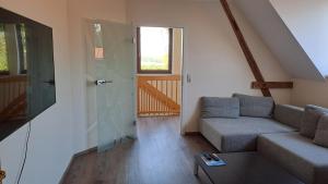 Χώρος καθιστικού στο Ferienwohnung Zum alten Kutscher +8 φωτογραφίες