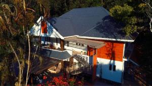 an overhead view of a house with a roof at Nadackal Nature County in Munnar