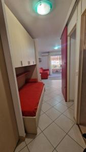 Ένα ή περισσότερα κρεβάτια σε δωμάτιο στο Riviera Beach