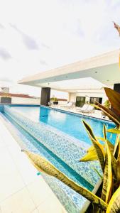 Bazén v ubytování Hilton Essence Studio, Airport-Accra nebo v jeho okolí