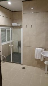 Koupelna v ubytování Hotel León