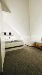 Łóżko lub łóżka w pokoju w obiekcie Apartament Słoneczny 1