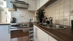 Kuchnia lub aneks kuchenny w obiekcie Apartament Słoneczny 1