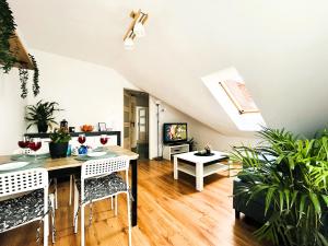 Telewizja i/lub zestaw kina domowego w obiekcie Apartament Słoneczny 1