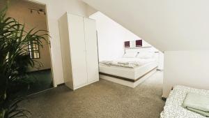 Łóżko lub łóżka w pokoju w obiekcie Apartament Słoneczny 1