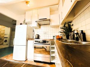 Kuchnia lub aneks kuchenny w obiekcie Apartament Słoneczny 1