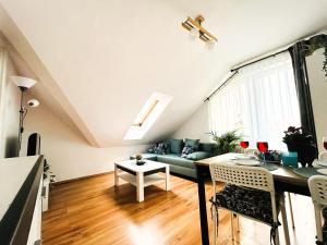 Telewizja i/lub zestaw kina domowego w obiekcie Apartament Słoneczny 1