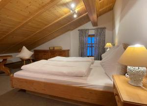 Postel nebo postele na pokoji v ubytování Chalet Zauberflöte