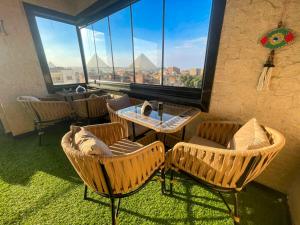 Un lugar para sentarse en Royal Pyramids View Inn
