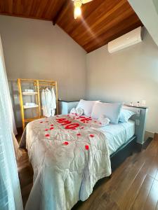 Ένα ή περισσότερα κρεβάτια σε δωμάτιο στο Loft Estradas da Serra