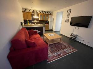 Kuchyň nebo kuchyňský kout v ubytování Appartements Charles De Gaulle